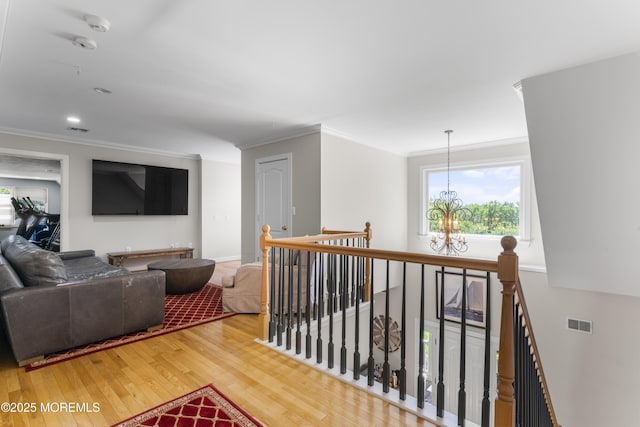 274 Beachview Ave, Manahawkin, NJ 08050 - living area with wood finished floors, a chandelier, ornamental molding, plenty of natural light, and recessed lighting