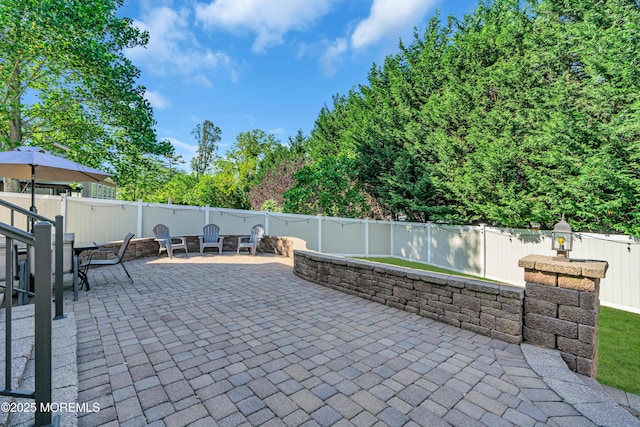 707 Cedar Point Ct, Toms River, NJ 08753 - fenced backyard with a patio and outdoor dining area