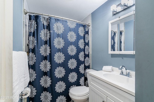 39 Scholer Dr, Union Beach, NJ 07735 - bathroom with vanity, toilet, and a shower with curtain