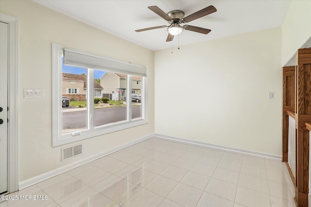 39 Scholer Dr, Union Beach, NJ 07735 - spare room featuring ceiling fan and baseboards