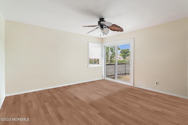 39 Scholer Dr, Union Beach, NJ 07735 - unfurnished room with baseboards, light wood-type flooring, and a ceiling fan
