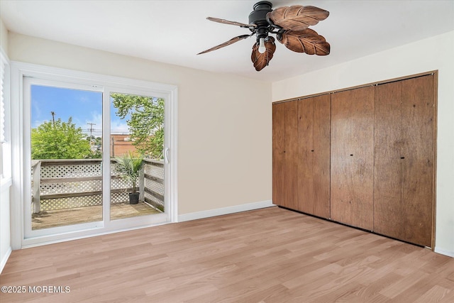 39 Scholer Dr, Union Beach, NJ 07735 - unfurnished bedroom featuring light wood-style floors, a closet, baseboards, and a ceiling fan