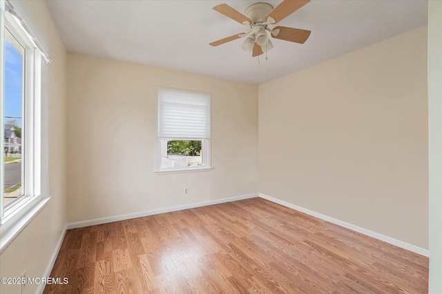 39 Scholer Dr, Union Beach, NJ 07735 - spare room with plenty of natural light, light wood-style floors, baseboards, and ceiling fan