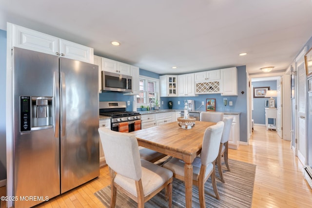 1707-1705 N Bayview Ave, Seaside Park, NJ 08752 - dining area with light wood-style floors, recessed lighting, and baseboards