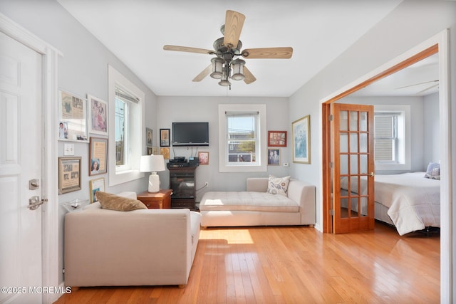 1707-1705 N Bayview Ave, Seaside Park, NJ 08752 - living room with light wood-style floors and a ceiling fan
