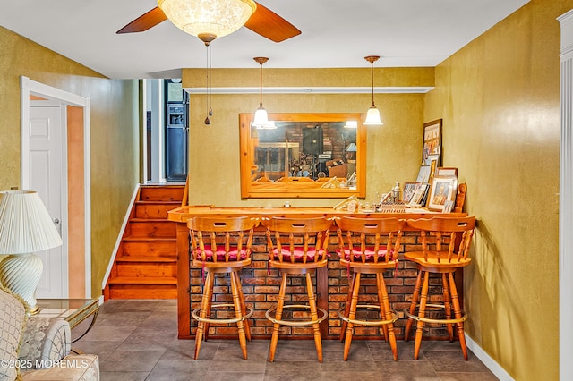 14 N Longview Rd, Howell, NJ 07731 - indoor dry bar featuring a ceiling fan, a textured wall, and pendant lighting