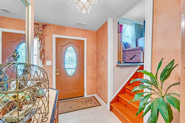 14 N Longview Rd, Howell, NJ 07731 - foyer featuring a chandelier, tile patterned floors, and baseboards