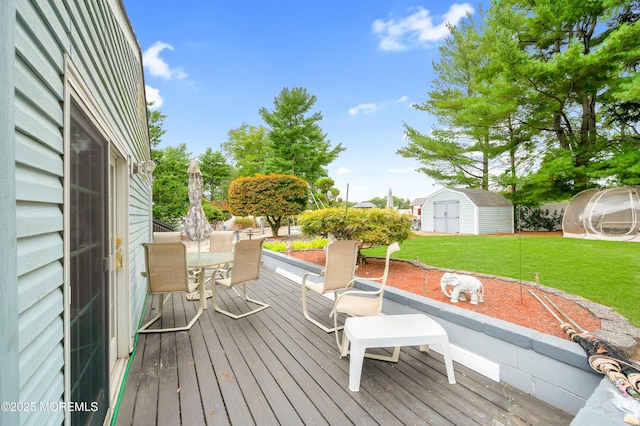 14 N Longview Rd, Howell, NJ 07731 - wooden deck with outdoor dining area and a yard