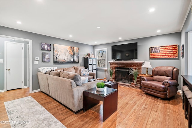 2897 State Route 138, Wall, NJ 07719 - living room featuring recessed lighting, light wood-type flooring, a brick fireplace, and baseboards