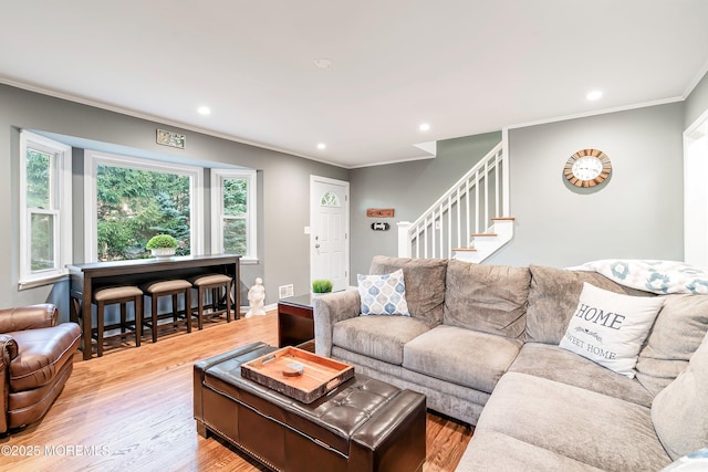 2897 State Route 138, Wall, NJ 07719 - living area featuring crown molding, light wood-style flooring, recessed lighting, stairway, and baseboards
