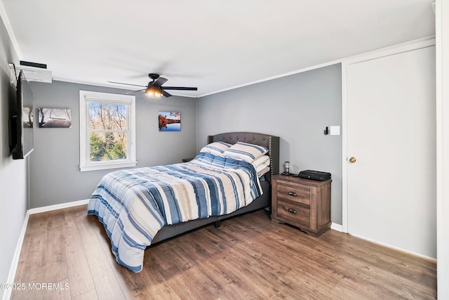 2897 State Route 138, Wall, NJ 07719 - bedroom with wood finished floors, baseboards, and ceiling fan
