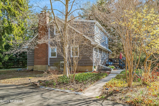 2897 State Route 138, Wall, NJ 07719 - view of side of property featuring a chimney