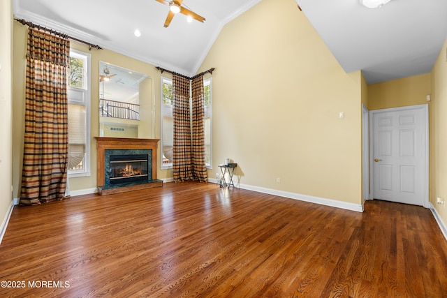 10 Emma Ln, Jackson, NJ 08527 - unfurnished living room with a ceiling fan, lofted ceiling, healthy amount of natural light, wood finished floors, and crown molding