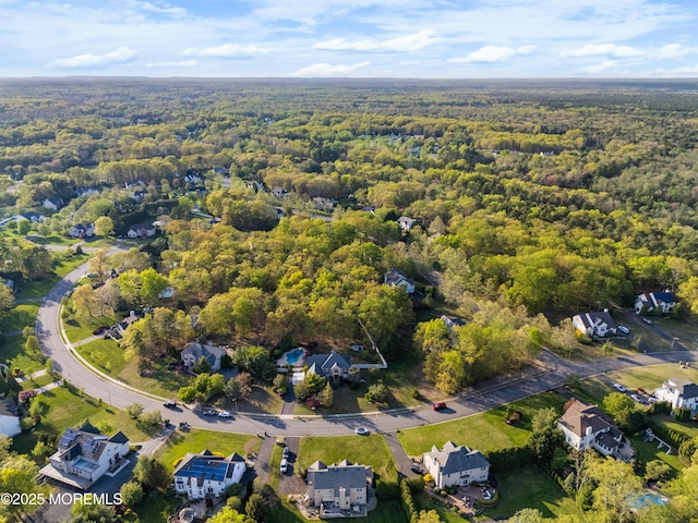 10 Emma Ln, Jackson, NJ 08527 - aerial view of property and surrounding area featuring a heavily wooded area and nearby suburban area