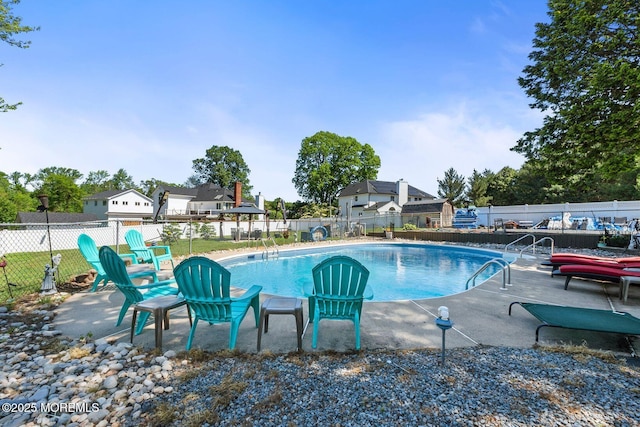 21 Wickatunk Rd, Manalapan, NJ 07726 - view of swimming pool featuring a patio area