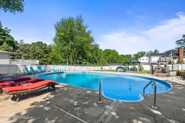 21 Wickatunk Rd, Manalapan, NJ 07726 - view of pool featuring a patio area