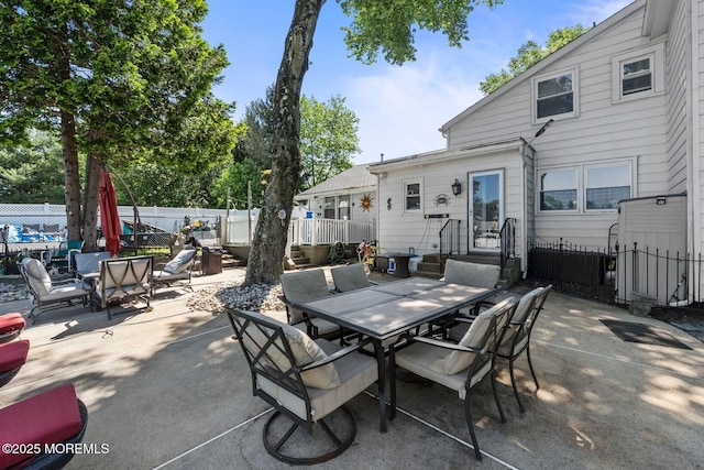 21 Wickatunk Rd, Manalapan, NJ 07726 - view of patio / terrace with outdoor dining space