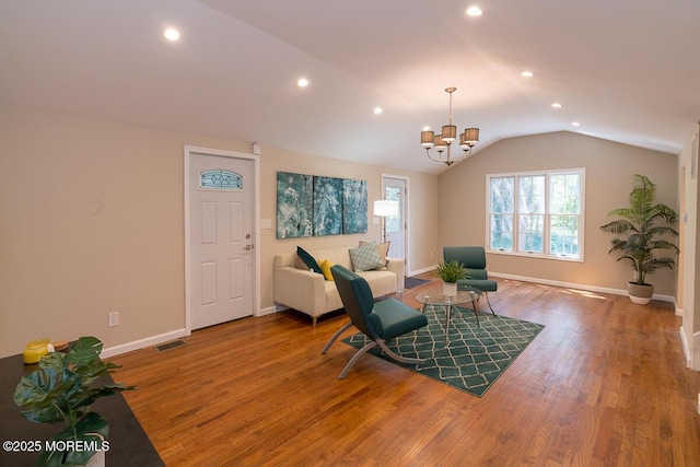 21 Wickatunk Rd, Manalapan, NJ 07726 - living room with a chandelier, wood finished floors, lofted ceiling, recessed lighting, and baseboards