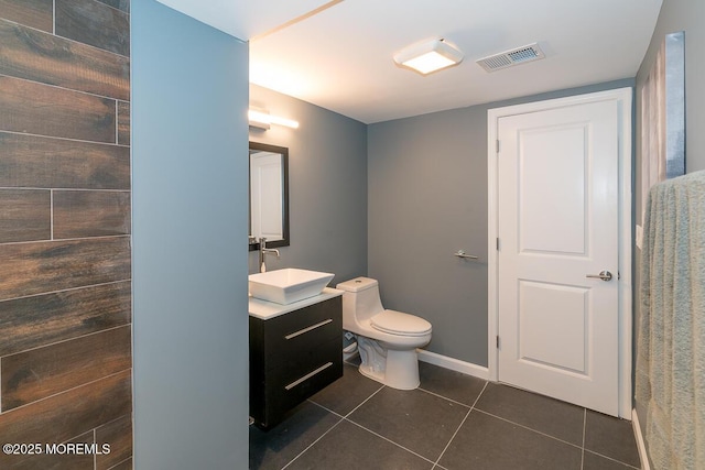 21 Wickatunk Rd, Manalapan, NJ 07726 - bathroom featuring vanity, tile patterned floors, toilet, and baseboards