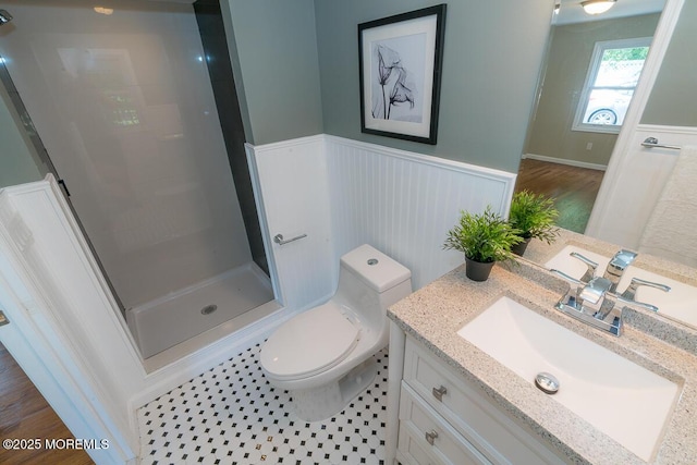 21 Wickatunk Rd, Manalapan, NJ 07726 - full bathroom with vanity, wainscoting, a stall shower, and toilet