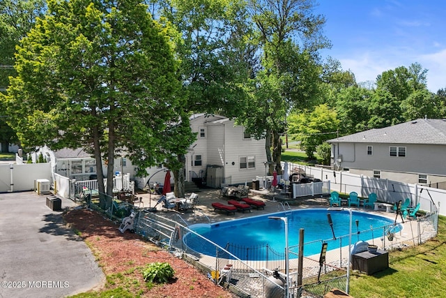 21 Wickatunk Rd, Manalapan, NJ 07726 - view of swimming pool with a patio and central air condition unit
