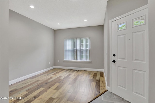 1103 Creamery Ct, Freehold, NJ 07728 - entrance foyer with recessed lighting and light wood-type flooring