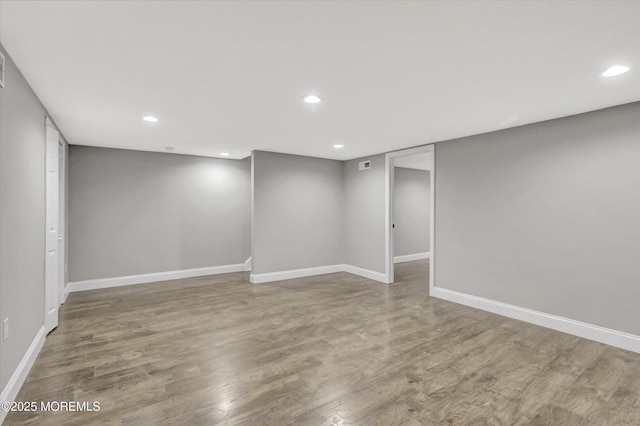 1103 Creamery Ct, Freehold, NJ 07728 - finished below grade area featuring wood finished floors and recessed lighting