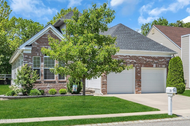 24 Beach Haven Way, Waretown, NJ 08758 - view of front of house with a garage, concrete driveway, a front yard, roof with shingles, and brick siding