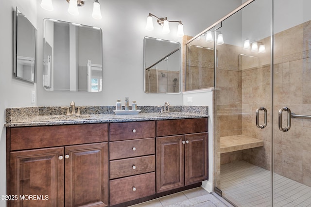 24 Beach Haven Way, Waretown, NJ 08758 - bathroom with double vanity, a stall shower, and tile patterned floors