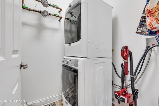 24 Beach Haven Way, Waretown, NJ 08758 - laundry room with stacked washer and clothes dryer and baseboards