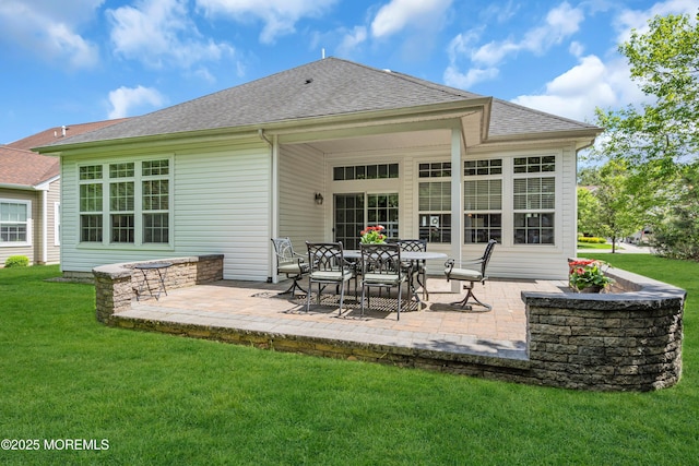 24 Beach Haven Way, Waretown, NJ 08758 - rear view of house featuring a patio area, a lawn, and a shingled roof