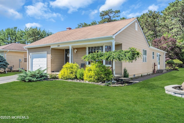 184 Pulaski Blvd, Toms River, NJ 08757 - single story home featuring an attached garage, a chimney, asphalt driveway, and a front yard
