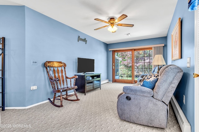184 Pulaski Blvd, Toms River, NJ 08757 - carpeted living room with a baseboard radiator, baseboards, and a ceiling fan