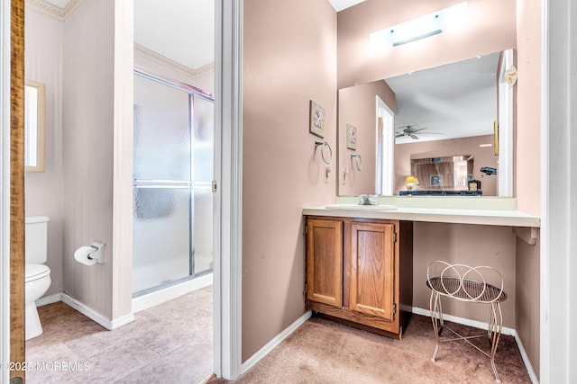 184 Pulaski Blvd, Toms River, NJ 08757 - full bath with a shower stall, vanity, toilet, ceiling fan, and baseboards