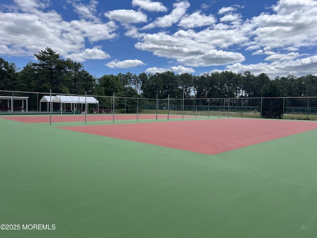 184 Pulaski Blvd, Toms River, NJ 08757 - view of tennis court with view of wooded area