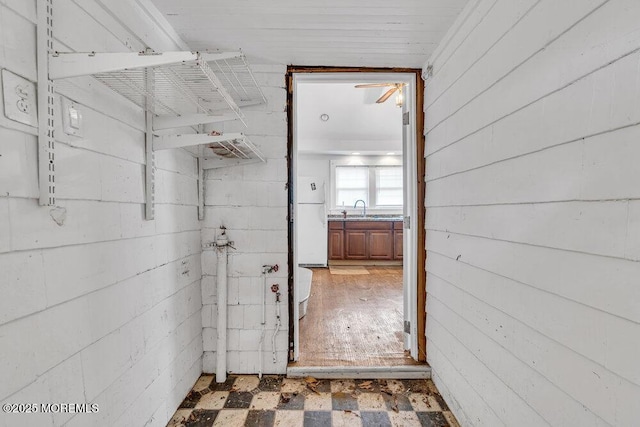 93 Lawrence Ave, Keansburg, NJ 07734 - bathroom featuring a sink, wooden walls, and tile patterned floors