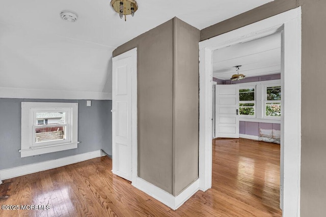 93 Lawrence Ave, Keansburg, NJ 07734 - additional living space featuring baseboards, wood finished floors, and vaulted ceiling