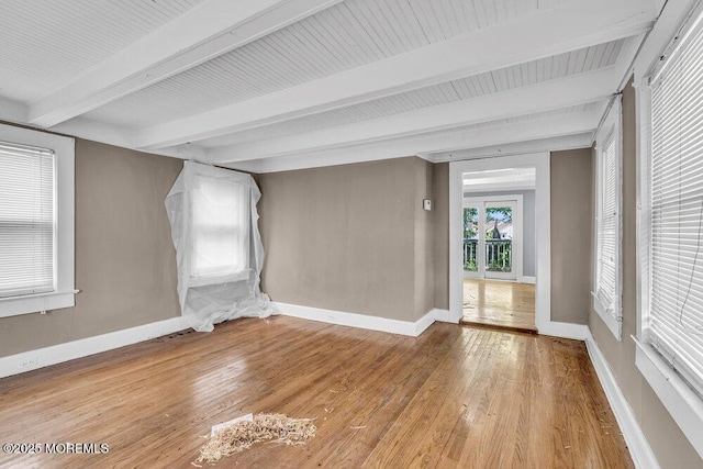 93 Lawrence Ave, Keansburg, NJ 07734 - empty room with beam ceiling, wood finished floors, and baseboards