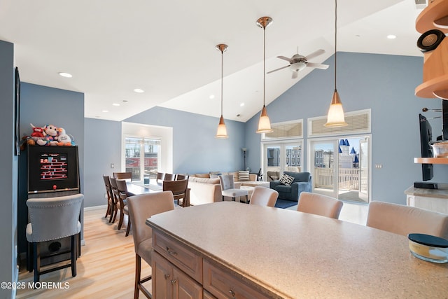 18 Sheridan Ave Unit 3, Seaside Heights, NJ 08751 - kitchen featuring ceiling fan, open floor plan, light wood-style floors, decorative light fixtures, and high vaulted ceiling