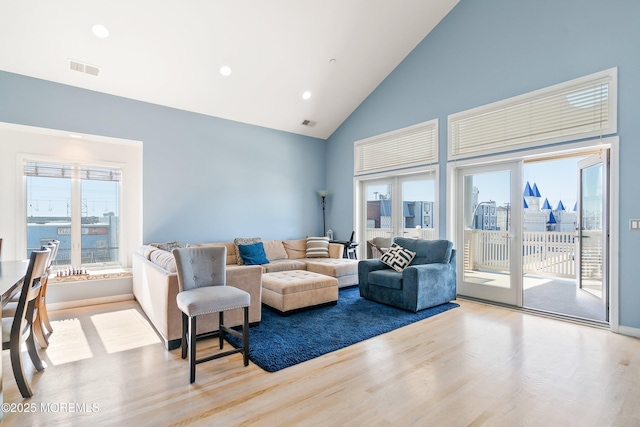 18 Sheridan Ave Unit 3, Seaside Heights, NJ 08751 - living room featuring high vaulted ceiling, wood finished floors, and recessed lighting