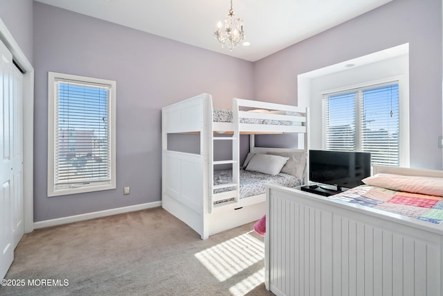 18 Sheridan Ave Unit 3, Seaside Heights, NJ 08751 - bedroom featuring a chandelier, carpet, and baseboards