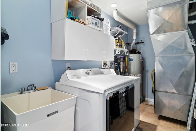 18 Sheridan Ave Unit 3, Seaside Heights, NJ 08751 - washroom with cabinet space, washer and dryer, heating unit, gas water heater, and light tile patterned flooring