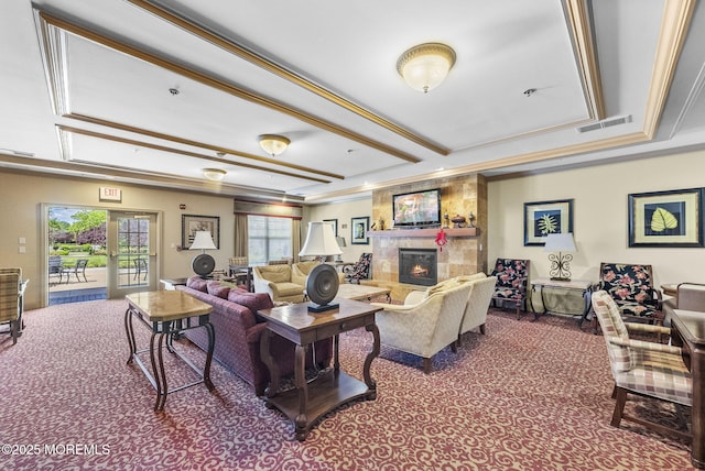 100 Middlesex Blvd Unit 144, Plainsboro, NJ 08536 - carpeted living room featuring a tiled fireplace and crown molding