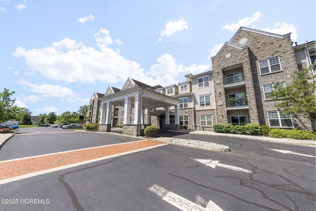 100 Middlesex Blvd Unit 144, Plainsboro, NJ 08536 - view of asphalt road with curbs and sidewalks