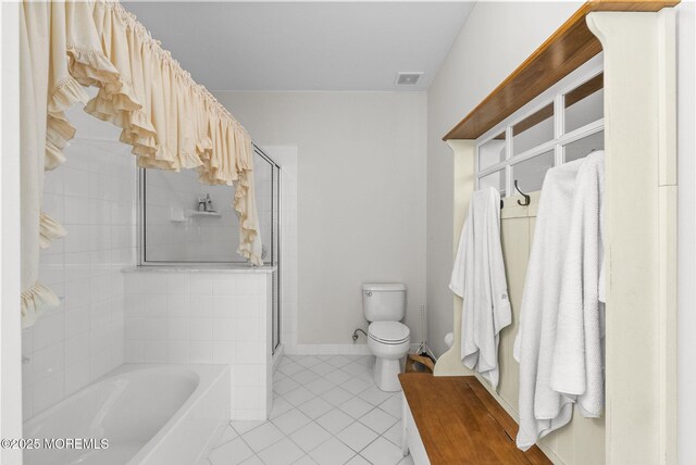 100 Middlesex Blvd Unit 144, Plainsboro, NJ 08536 - full bathroom featuring tile patterned flooring, a garden tub, a stall shower, toilet, and baseboards