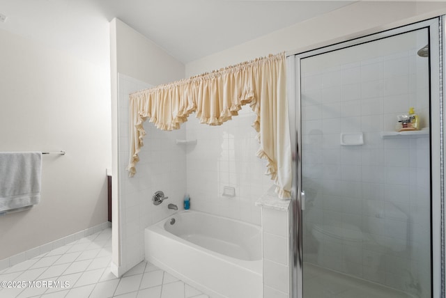 100 Middlesex Blvd Unit 144, Plainsboro, NJ 08536 - bathroom with tile patterned flooring, a shower with door, a tub, and baseboards