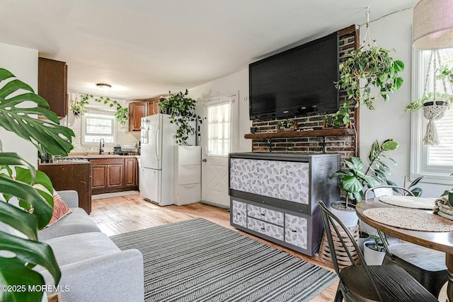 33 Cumberland Dr, Brick, NJ 08723 - living area featuring plenty of natural light, light wood finished floors, and a large fireplace
