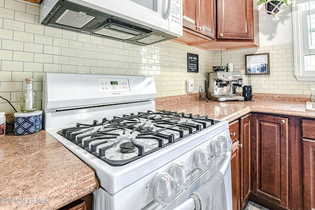 33 Cumberland Dr, Brick, NJ 08723 - kitchen featuring white appliances, light countertops, decorative backsplash, and brown cabinets