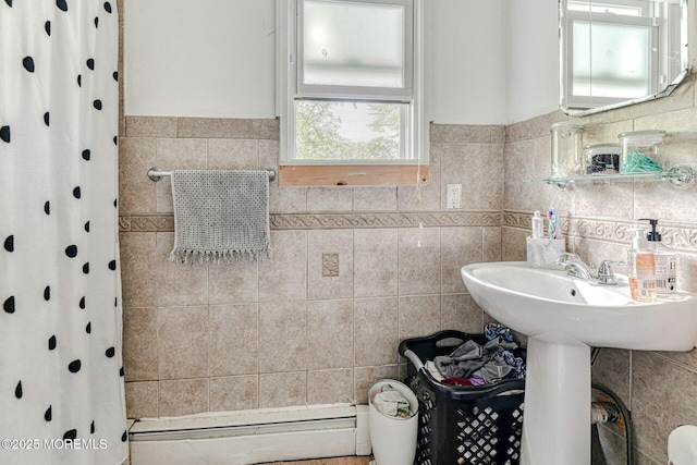 33 Cumberland Dr, Brick, NJ 08723 - bathroom with tile walls, a baseboard radiator, curtained shower, and wainscoting