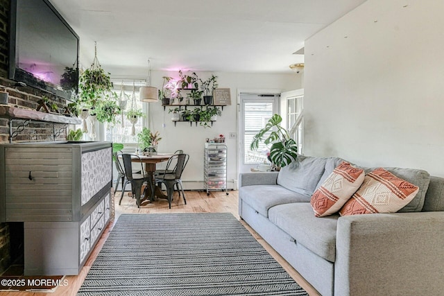 33 Cumberland Dr, Brick, NJ 08723 - living room featuring wood finished floors, a fireplace, and a baseboard radiator